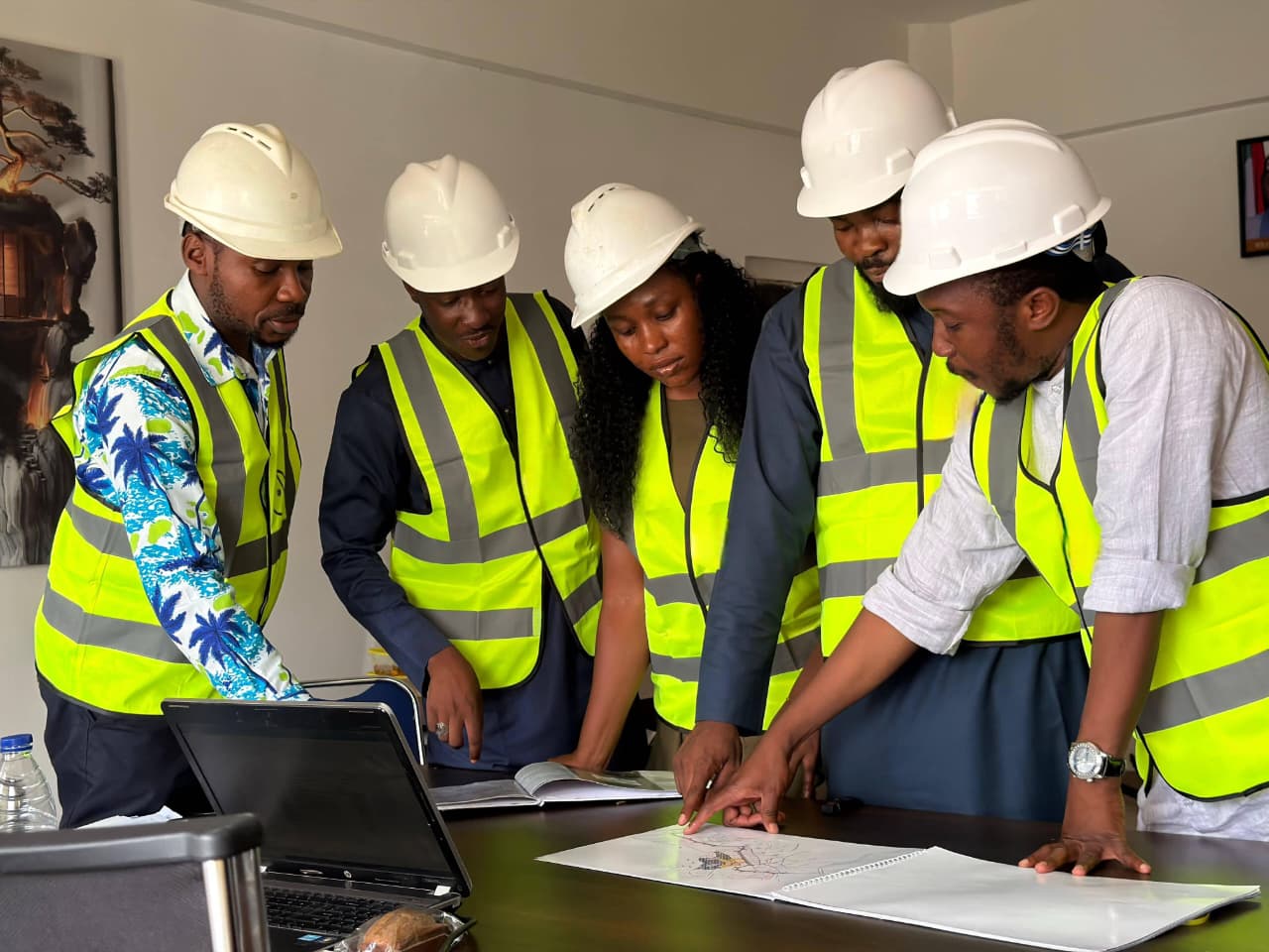 Professional consultants reviewing disaster risk maps